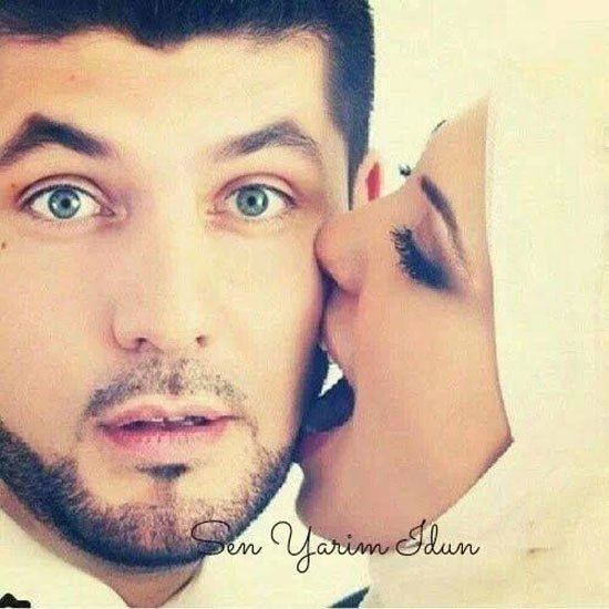muslim bride kissing groom