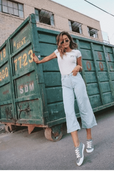 Bell bottom jeans with basic white t-shirt (classic combination)