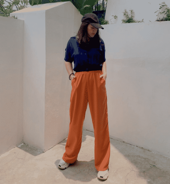 Blue Formal Pants For Women's Paired With Orange Full Sleeve T-Shirt And  Flat Footwear With White Background, Blue Formal Pants For Women's Paired  With Orange Full Sleeve T-Shirt And Flat Footwear With