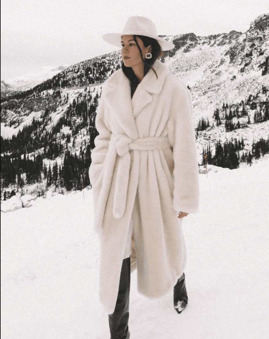 Big fuzzy white coat ski trip outfit