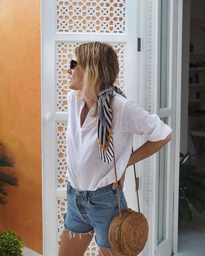 Style a round mini bag in a casual way